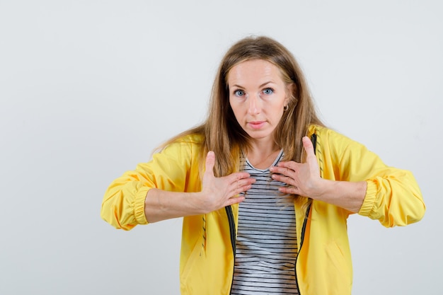 Expressive young woman posing in the studio