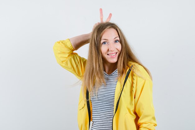 Expressive young woman posing in the studio