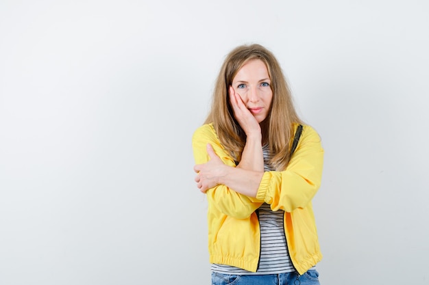 Expressive young woman posing in the studio