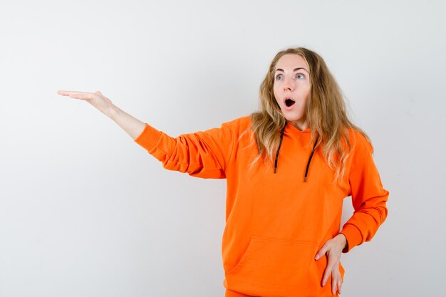 Expressive young woman posing in the studio