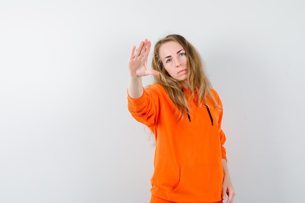 Expressive young woman posing in the studio