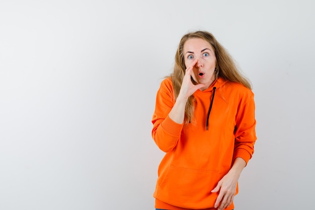 Expressive young woman posing in the studio