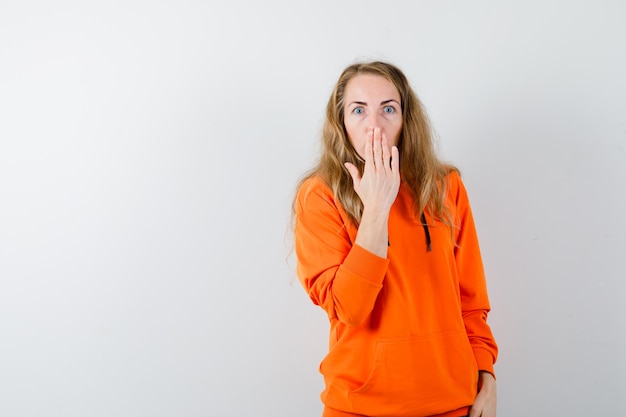 Expressive young woman posing in the studio