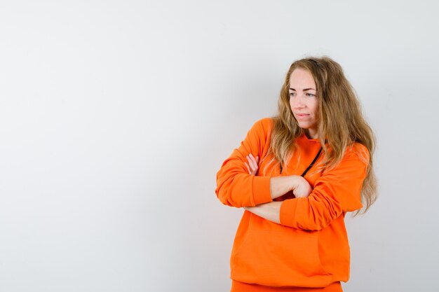 Expressive young woman posing in the studio