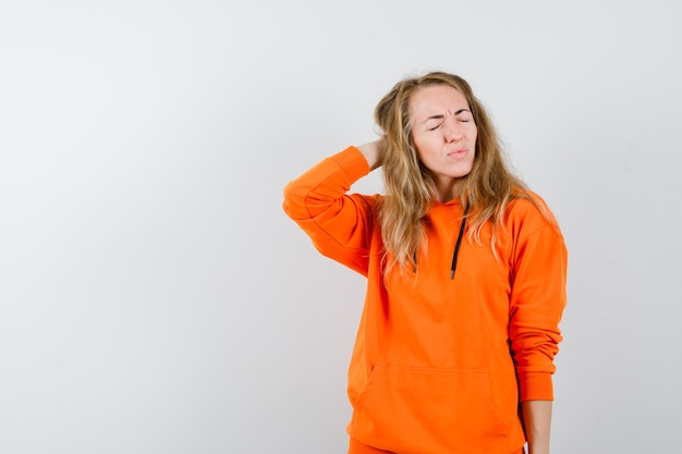 Expressive young woman posing in the studio