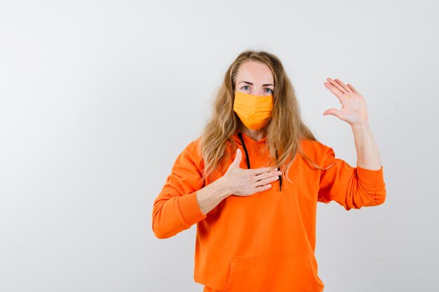 Expressive young woman posing in the studio