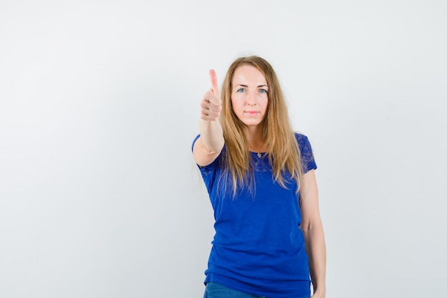 Expressive young woman posing in the studio