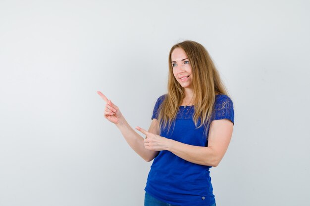 Expressive young woman posing in the studio