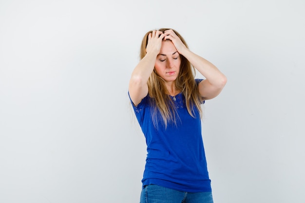 Expressive young woman posing in the studio