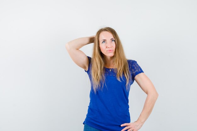 Expressive young woman posing in the studio