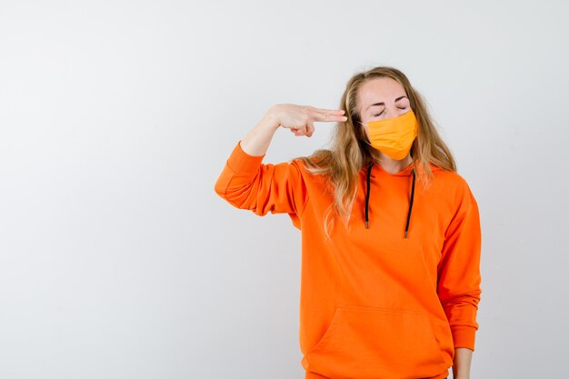 Expressive young woman posing in the studio