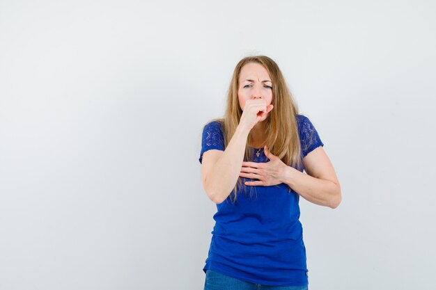 Expressive young woman posing in the studio