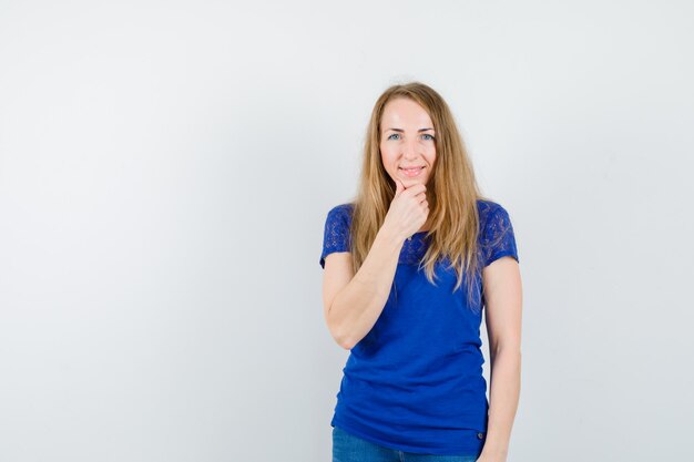 Expressive young woman posing in the studio