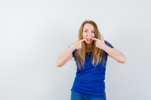 Expressive young woman posing in the studio