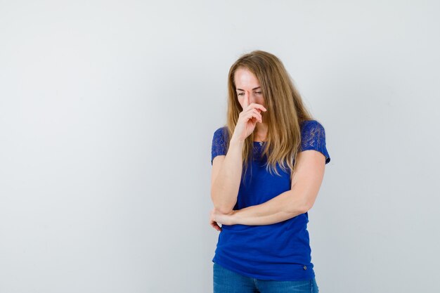 Expressive young woman posing in the studio