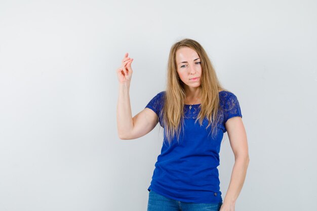 Expressive young woman posing in the studio