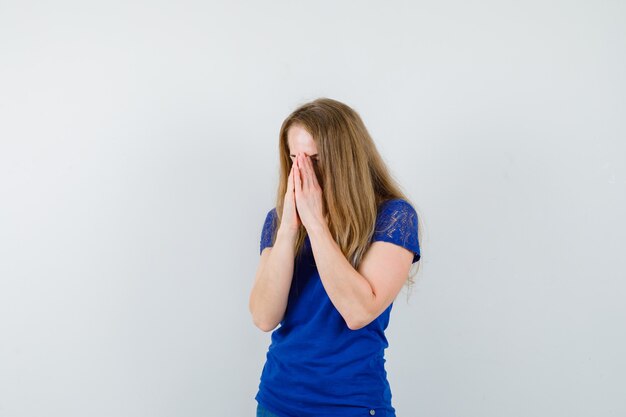 Expressive young woman posing in the studio