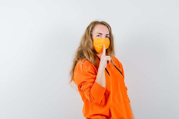 Expressive young woman posing in the studio