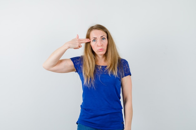 Expressive young woman posing in the studio