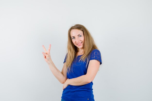 Expressive young woman posing in the studio