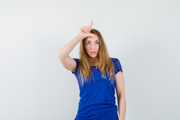 Expressive young woman posing in the studio