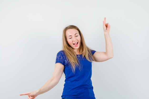 Expressive young woman posing in the studio