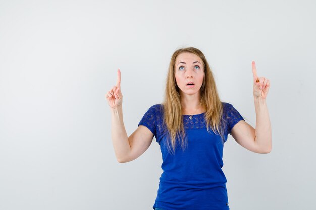 Expressive young woman posing in the studio