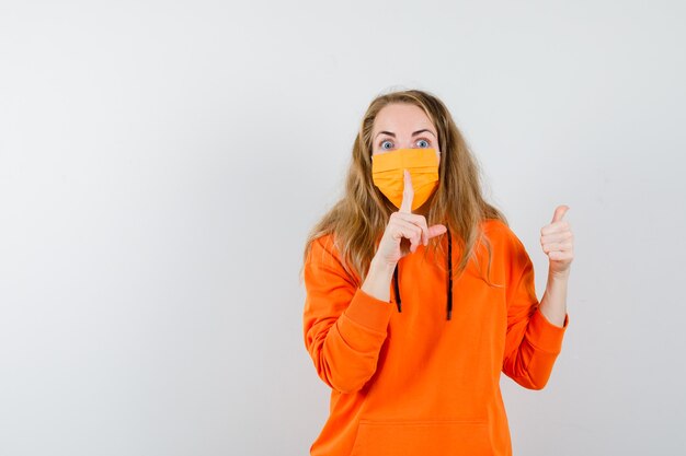 Expressive young woman posing in the studio