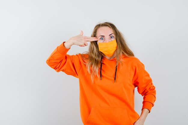 Expressive young woman posing in the studio