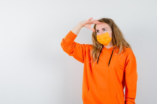 Expressive young woman posing in the studio