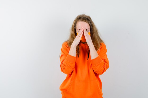 Expressive young woman posing in the studio