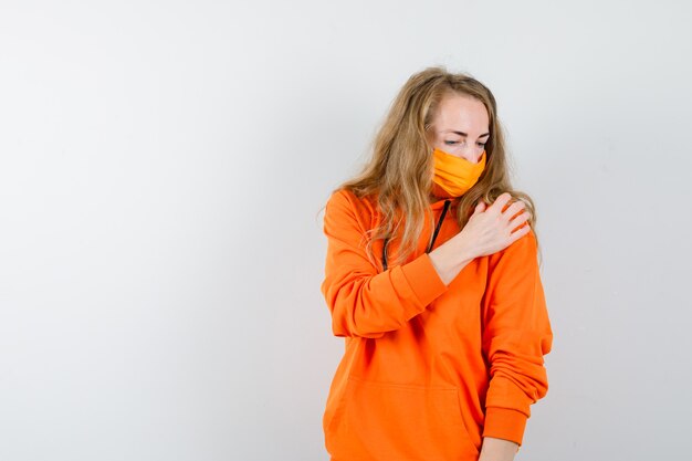 Expressive young woman posing in the studio