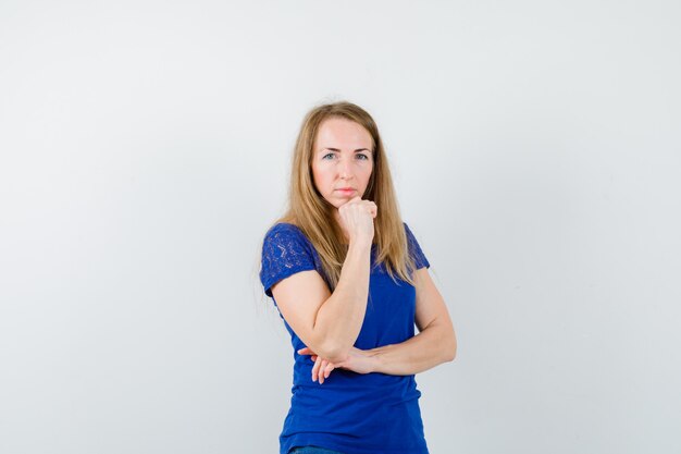 Expressive young woman posing in the studio