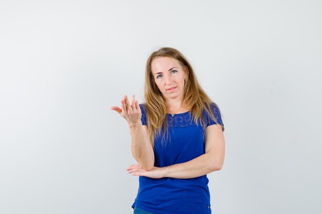 Expressive young woman posing in the studio