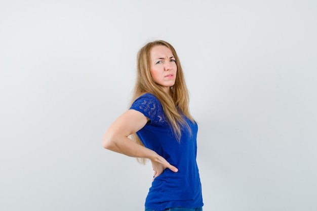 Expressive young woman posing in the studio