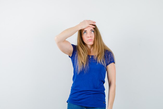 Expressive young woman posing in the studio