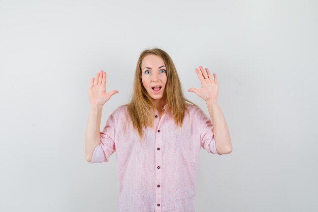 Expressive young woman posing in the studio