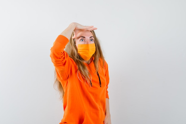 Expressive young woman posing in the studio