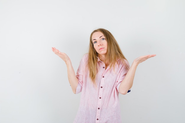 Expressive young woman posing in the studio