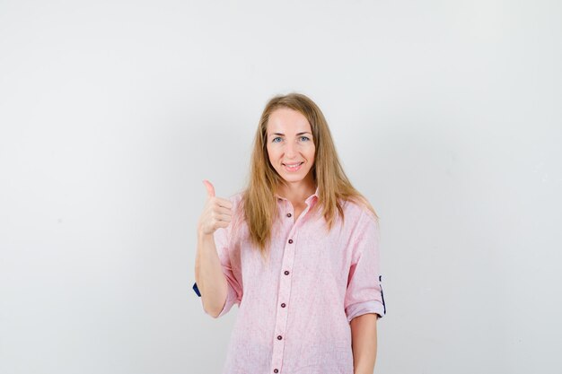 Expressive young woman posing in the studio