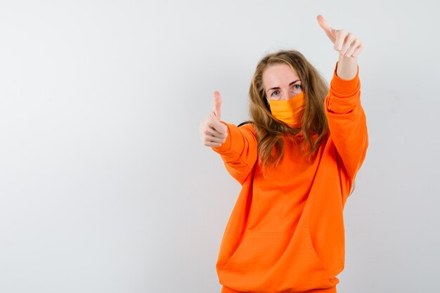 Expressive young woman posing in the studio