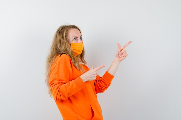 Expressive young woman posing in the studio