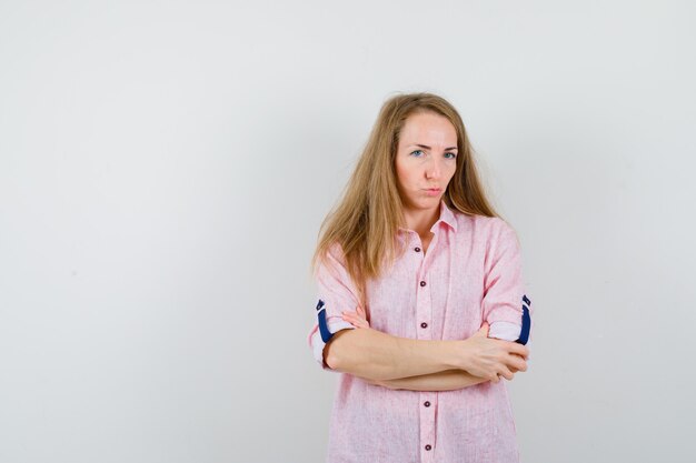 Expressive young woman posing in the studio