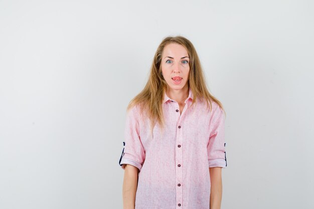 Expressive young woman posing in the studio