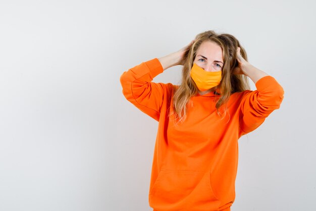 Expressive young woman posing in the studio