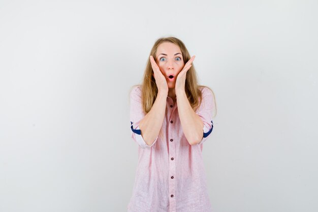 Expressive young woman posing in the studio