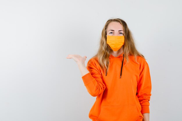 Expressive young woman posing in the studio