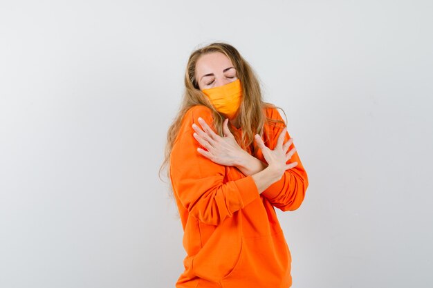 Expressive young woman posing in the studio