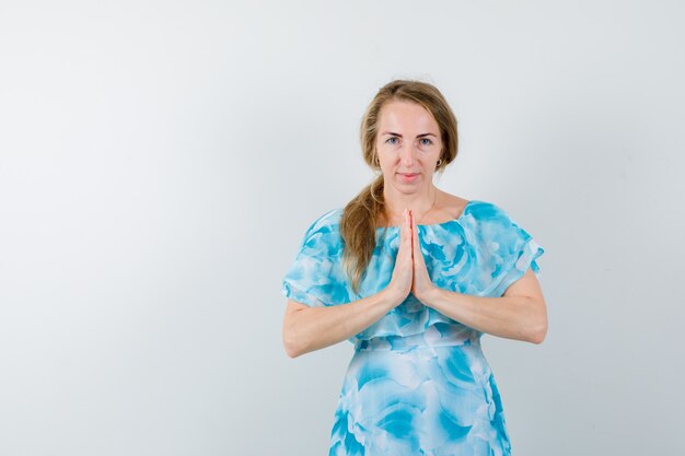 Expressive young woman posing in the studio