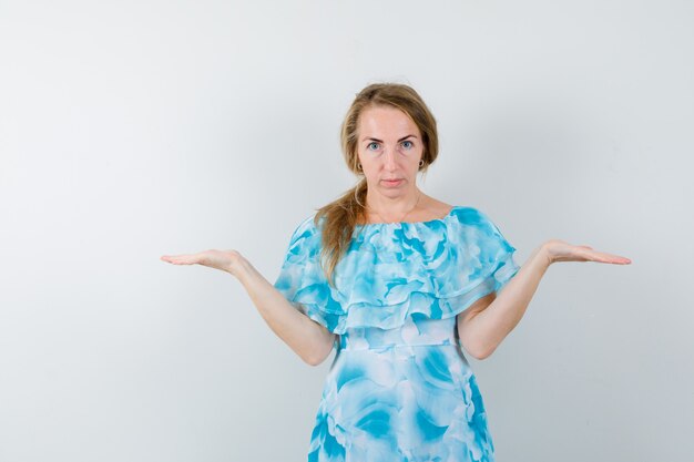 Expressive young woman posing in the studio